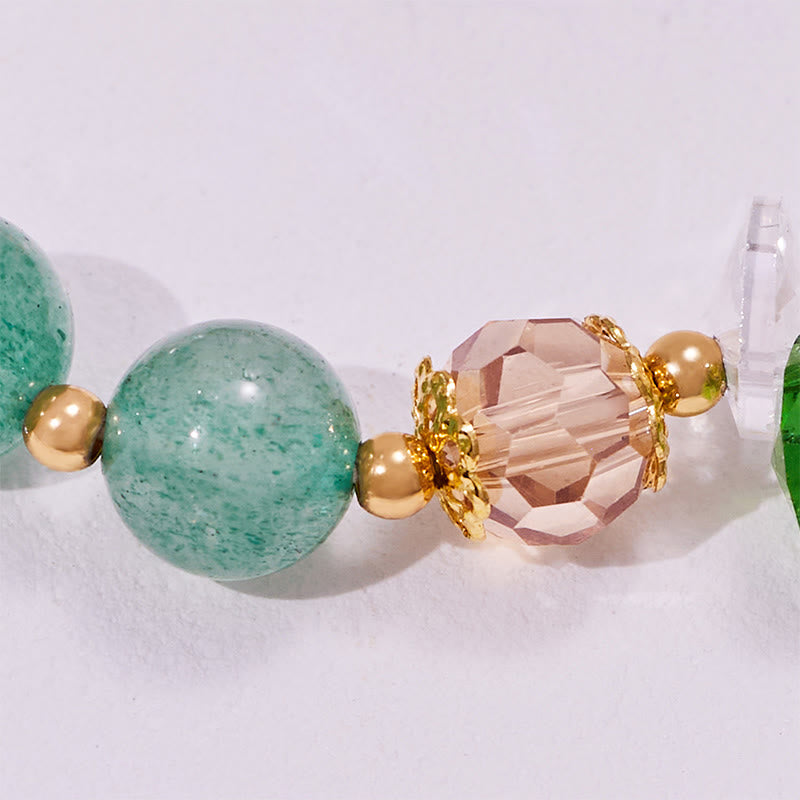 Olivenorma Armband mit Herzanhänger aus klarem Glas mit grünem Aventurin