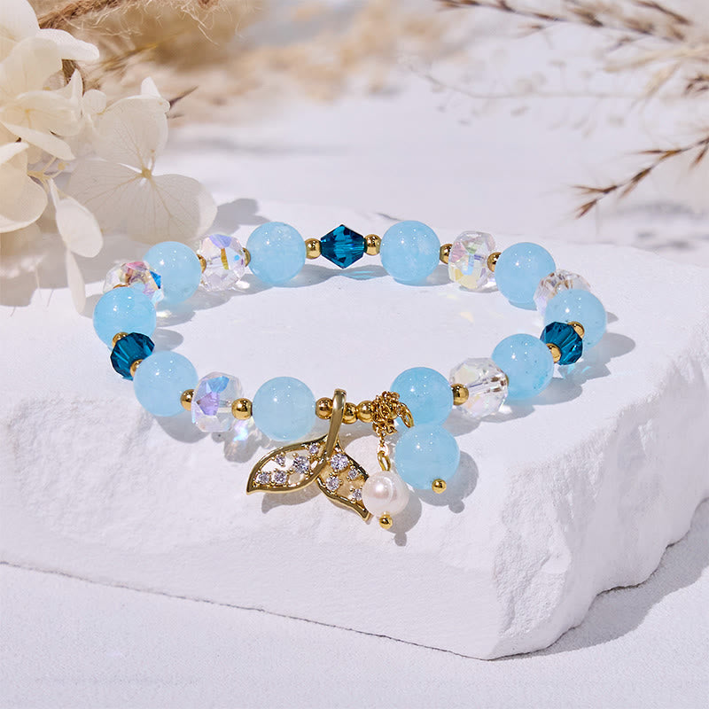 Olivenorma Aquamarin-Armband mit klaren Glasperlen und Walschwanz