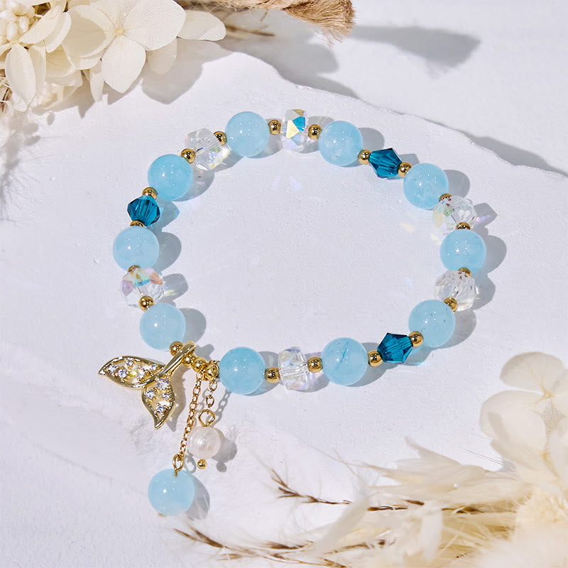 Olivenorma Aquamarin-Armband mit klaren Glasperlen und Walschwanz