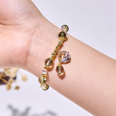 Olivenorma Armband mit grünen Phantomquarzperlen aus klarem Glas