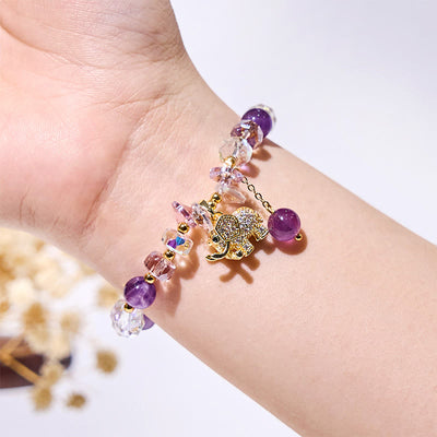 Olivenorma Armband mit Elefantenanhänger und Amethyst-Klarglasperlen