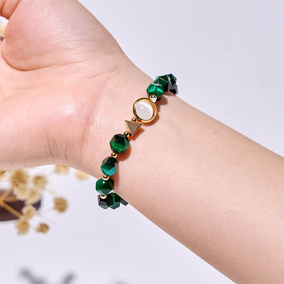 Olivenorma Armband mit facettierten grünen Tigeraugenperlen