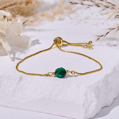 Olivenorma Armband mit facettierten grünen Tigeraugenperlen