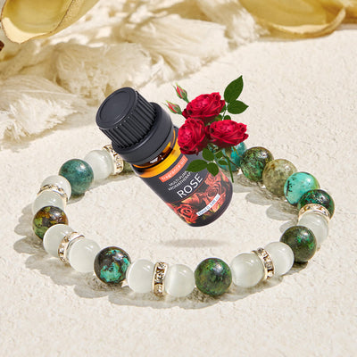 Olivenorma „Serenite Flow“ Armband mit ätherischen Ölen aus afrikanischem Türkis, beruhigend und reinigend - Armband + ätherisches Rosenöl - image 1