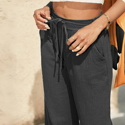 Olivenorma Einfarbige, elastische Damen-Baggy-Hose aus Leinen mit mittlerer Taille und Taschen - image 3