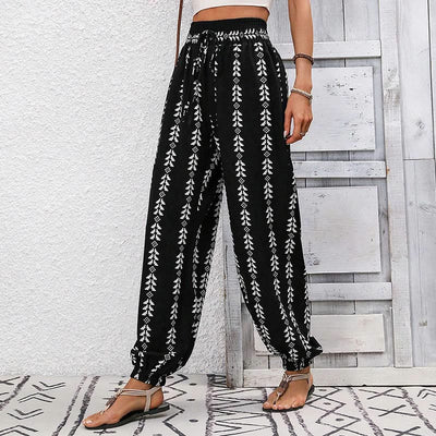 Olivenorma – Haremshose aus Polyester mit fließendem Print