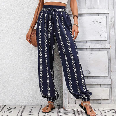 Olivenorma – Haremshose aus Polyester mit fließendem Print