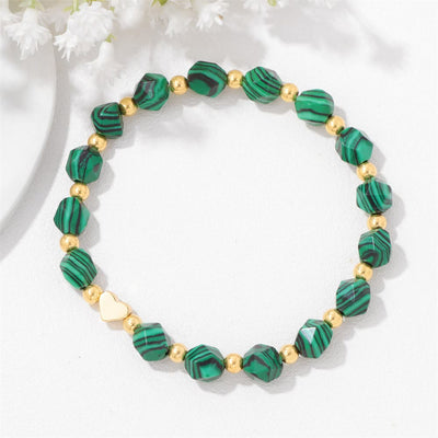 Olivenorma – 8 mm großes Armband mit facettierten Edelsteinen und Herzperlen - Malachit - image 1