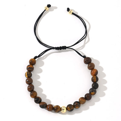 Olivenorma – Verstellbares, geflochtenes Perlenarmband mit Naturkristallen - Tigerauge - image 2
