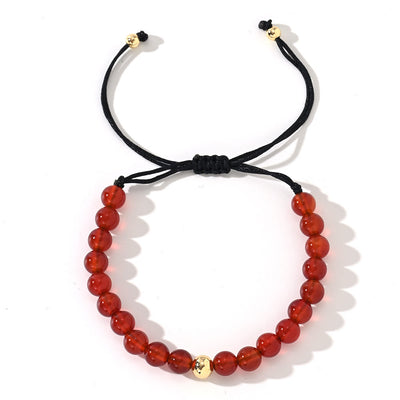 Olivenorma – Verstellbares, geflochtenes Perlenarmband mit Naturkristallen - Granat - image 10