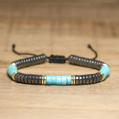 Olivenorma – Verstellbares, geflochtenes Perlenarmband mit Naturkristallen - Türkis + Hämatit - image 13