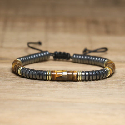 Olivenorma – Verstellbares, geflochtenes Perlenarmband mit Naturkristallen - Tigerauge + Hämatit - image 2