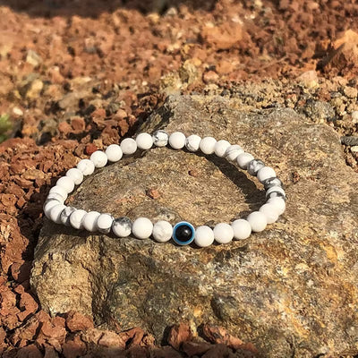 Olivenorma Armband mit runden Perlen aus Naturstein mit bösem Blick, 6 mm/8 mm - 8 mm - Howlith - image 5