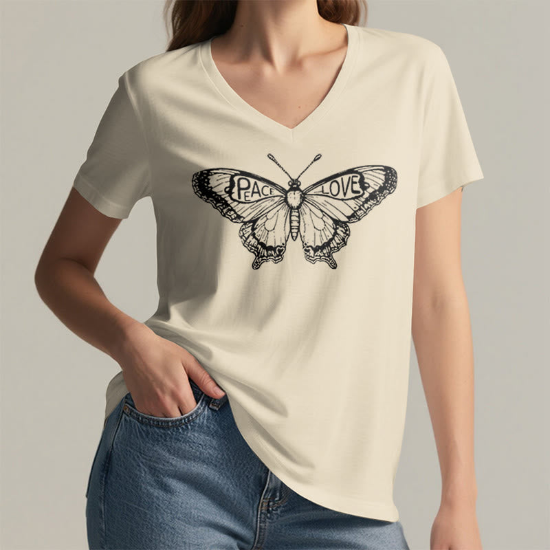 Olivenorma PEACE & LOVE Schmetterling Kurzarm-T-Shirt mit V-Ausschnitt aus Baumwolle - image 13