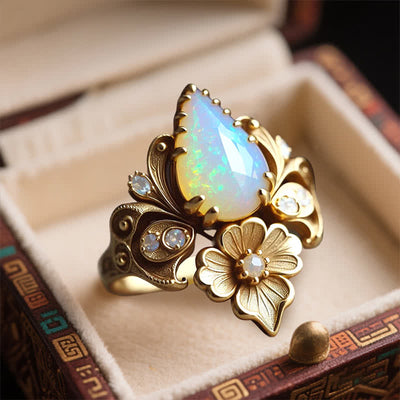 Olivenorma „Tränen der Sonne“ Feueropal-Blumenring - image 3