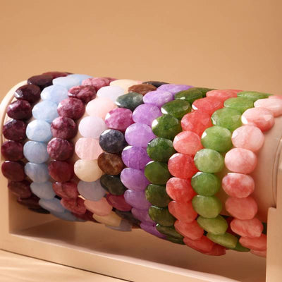 Olivenorma Stretch-Armband mit natürlichen Edelsteinen, 14 mm, facettierte ovale Perlen - image 0