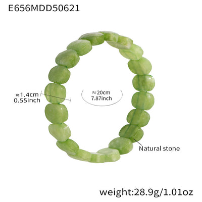 Olivenorma Stretch-Armband mit natürlichen Edelsteinen, 14 mm, facettierte ovale Perlen - Peridot - image 7
