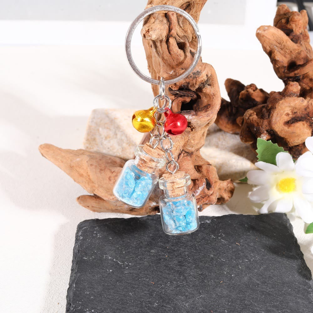 Olivenorma Natürliche Kristallsplitter in Mini-Glasflasche als Schlüsselanhänger mit Glöckchen - Blauer Apatit - image 14
