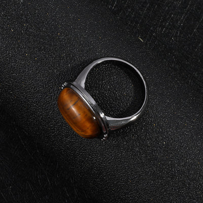 Olivenorma Oval verstellbarer schwarzer Ring mit Tigerauge