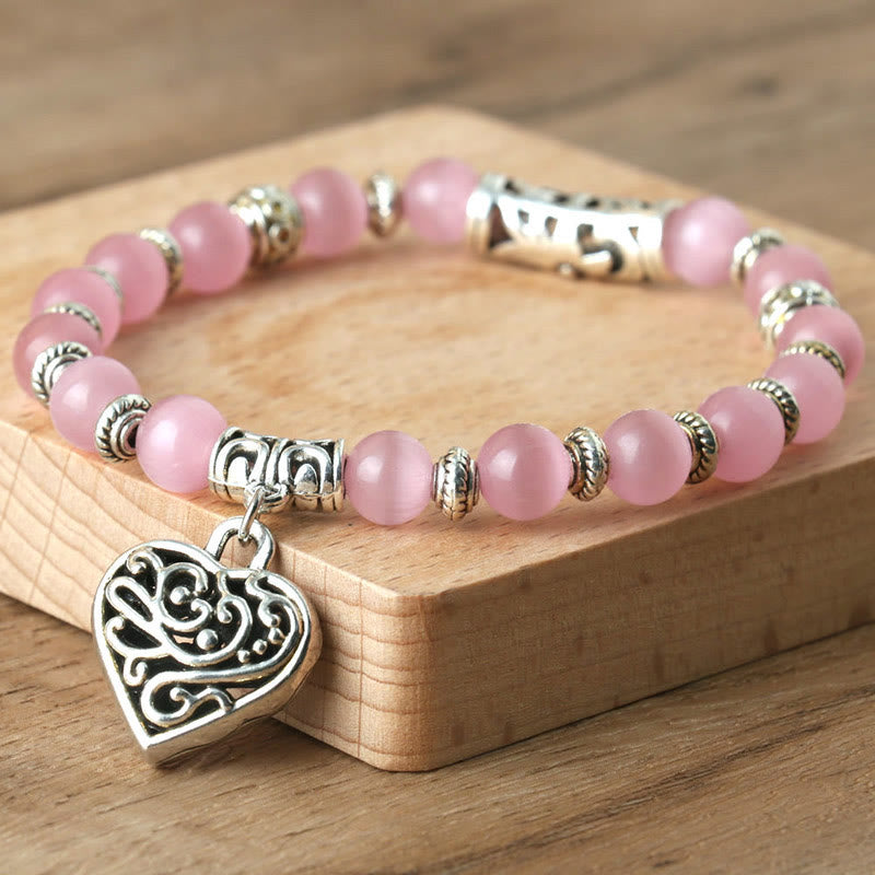 Olivenorma Hohl-Liebe-Anhänger Pink-Katzenauge-Armband 