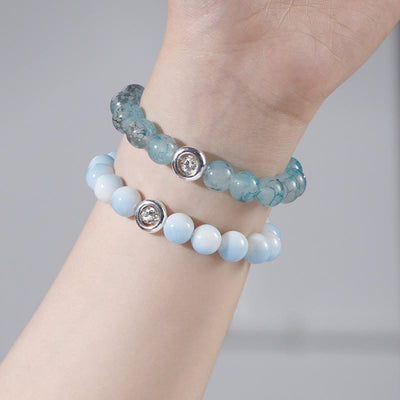 Olivenorma Armband mit blauen Glas-Kristallperlen 