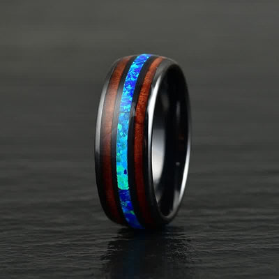 Olivenorma Koa Wood und Abalone Shell Wolframkarbid Ring