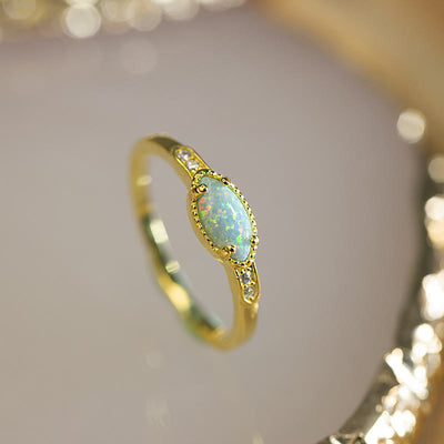 Olivenorma Opal Weißer Zirkon S925 Goldring