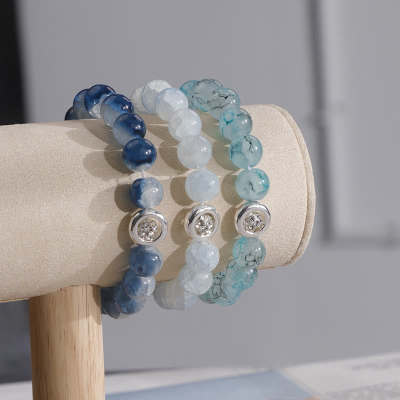 Olivenorma Armband mit blauen Glas-Kristallperlen 