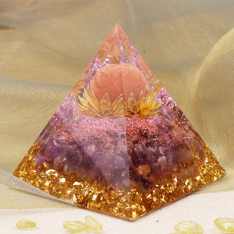 Olivenorma Sonnenstein Kugel mit Amethyst-Orgonpyramide