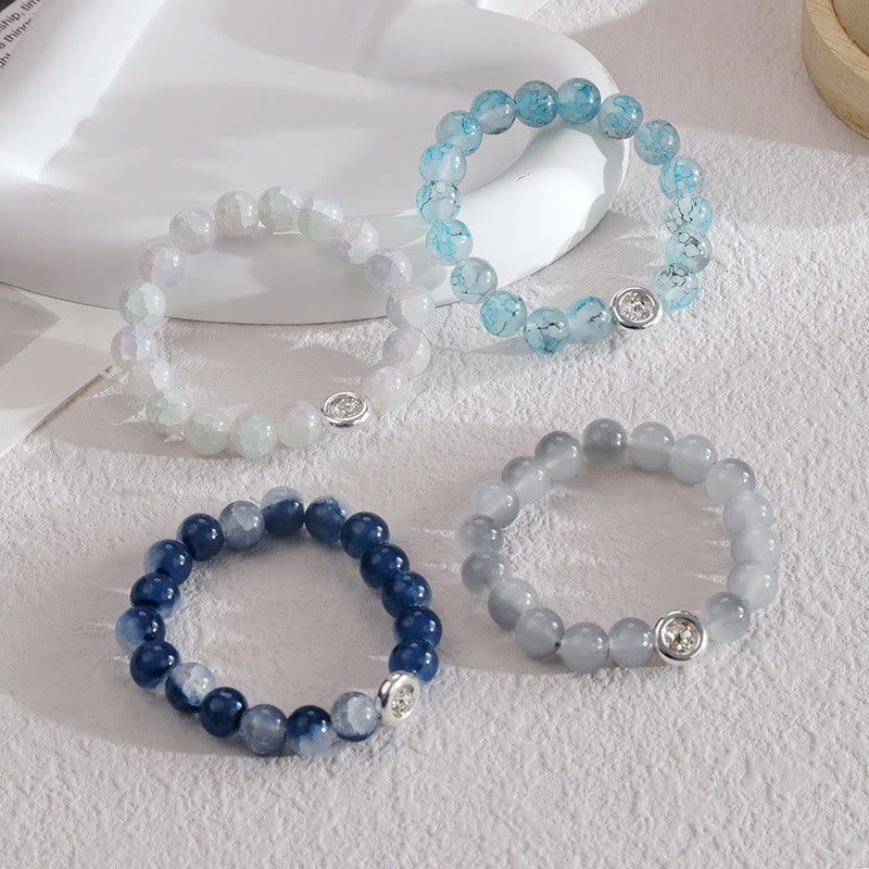 Olivenorma Armband mit blauen Glas-Kristallperlen 