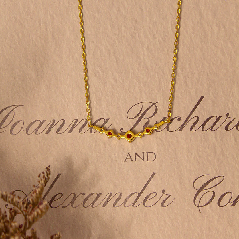 Olivenorma "Symbol der Unabhängigkeit" Granat Diamant Halskette