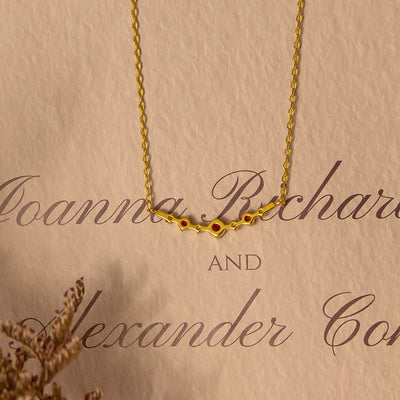Olivenorma "Symbol der Unabhängigkeit" Granat Diamant Halskette