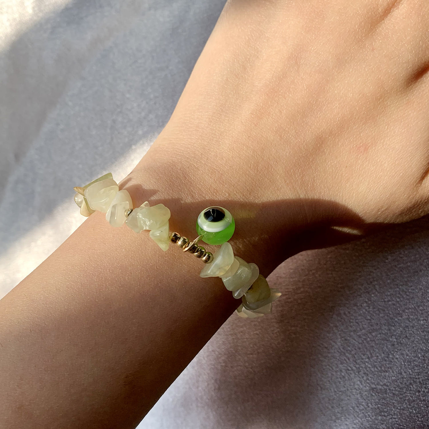 Olivenorma Natürliches Kristallkies Böse-Auge-Anhänger Armband